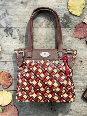 Fossil Brown Canvas & Leather Trim Key-Per Tote with Red and Cream Geo Print